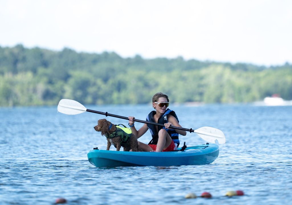 Teen and Dog Kayaking